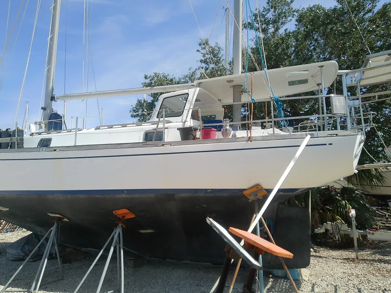 Slide: The Image of 1971 Morgan 40 Cruising Ketch sailboat on dry dock, side view. - 5