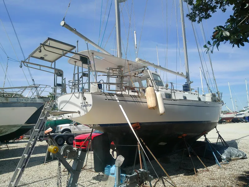 Slide: The Image of 1971 Morgan 40 Cruising Ketch sailboat on dry dock, ready for maintenance. - 9