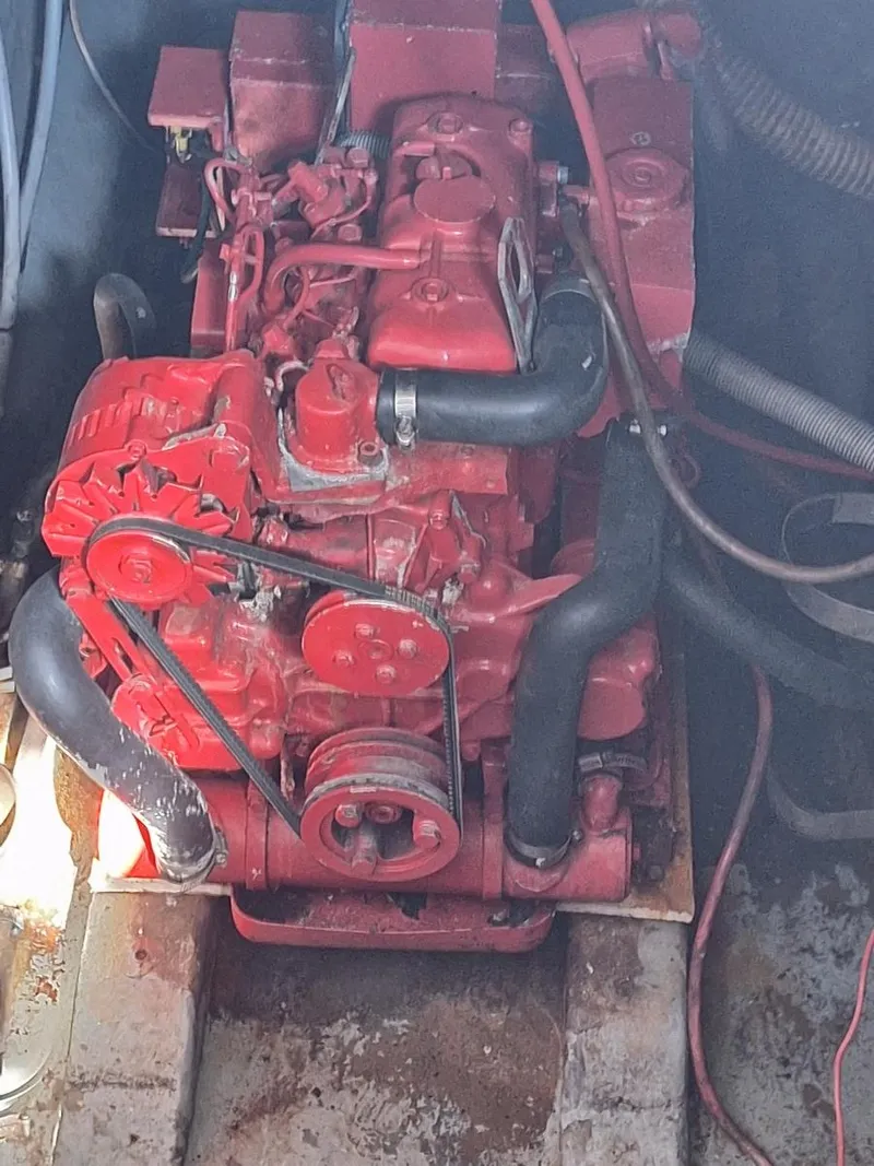 Slide: The Image of Engine of 1985 Sea Ray 390 Express Cruiser, red components, detailed view. - 19