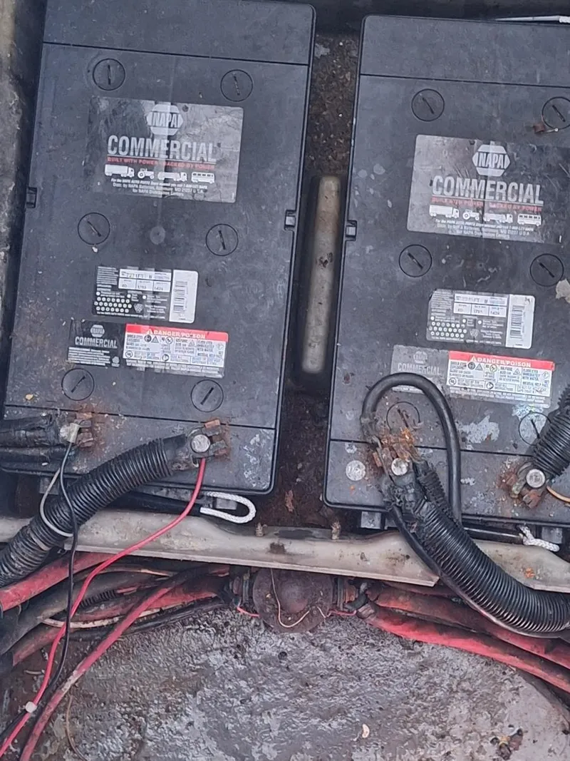 Slide: The Image of Batteries in 1985 Sea Ray 390 Express Cruiser engine compartment. - 20