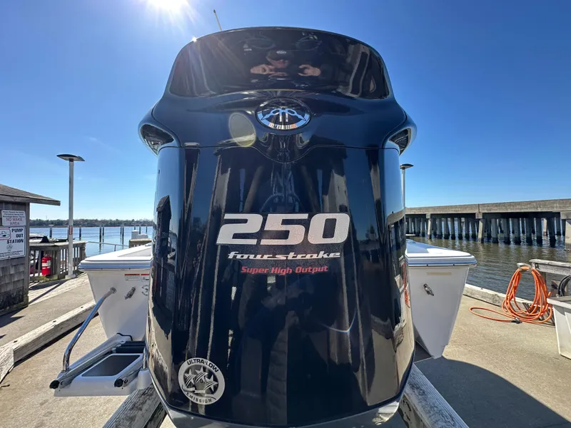 Slide: The Image of 2021 Sportsman Masters 247 Bay Boat with 250 four-stroke engine at dock. - 11