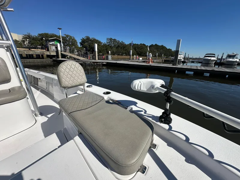 Slide: The Image of 2021 Sportsman Masters 247 Bay Boat at dock, featuring comfortable seating and sleek design. - 26