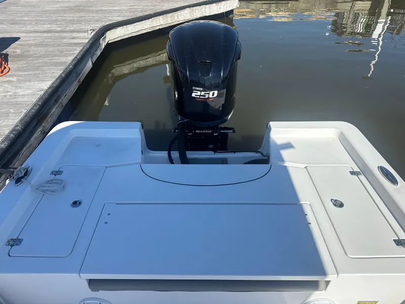 Slide: The Image of 2021 Sportsman Masters 247 Bay Boat with 250 HP engine at dock. - 29