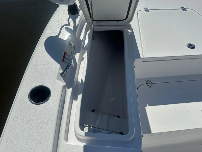 Slide: The Image of Open storage compartment on a 2021 Sportsman Masters 247 Bay Boat. - 36