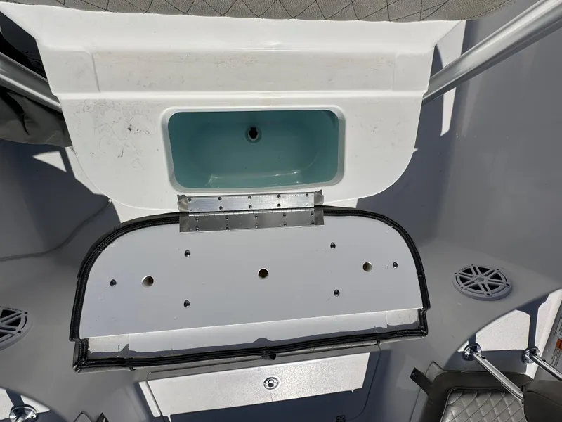 Slide: The Image of 2021 Sportsman Masters 247 Bay Boat livewell with open lid, showcasing interior design. - 39
