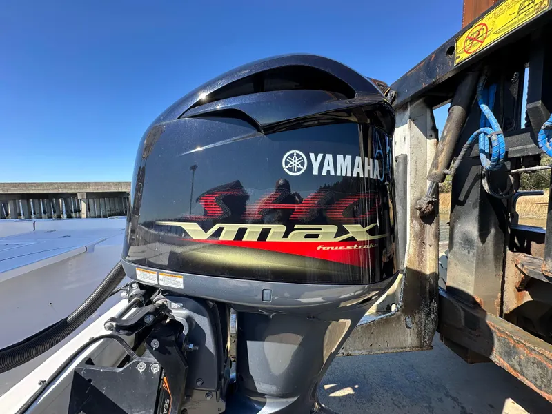 Slide: The Image of Yamaha VMAX outboard motor on 2021 Sportsman Masters 247 Bay Boat. - 9