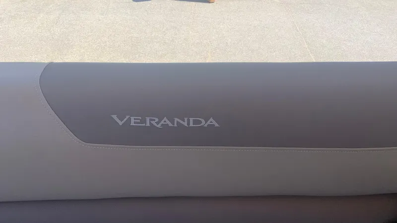 Slide: The Image of 2022 Veranda Relax VR22RC boat seat with logo, gray upholstery. - 10