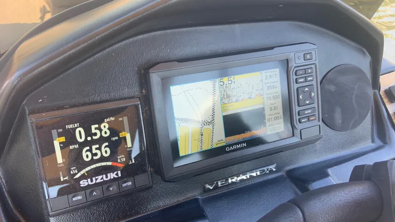 Slide: The Image of Dashboard of 2022 Veranda Relax VR22RC with Suzuki and Garmin displays. - 23