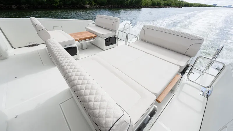 Slide: The Image of Luxurious seating area on 2025 Catana YOT 41 yacht, featuring elegant design and waterfront view. - 11