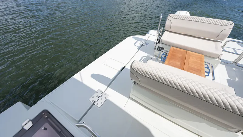 Slide: The Image of Luxury seating on Catana YOT 41 yacht, 2025 model, overlooking calm waters. - 12