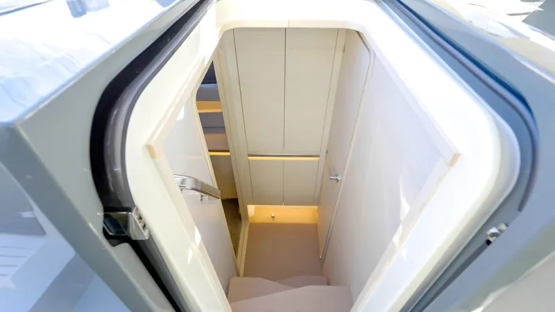 Slide: The Image of Interior staircase of 2025 Catana YOT 41 yacht, featuring modern design and lighting. - 15