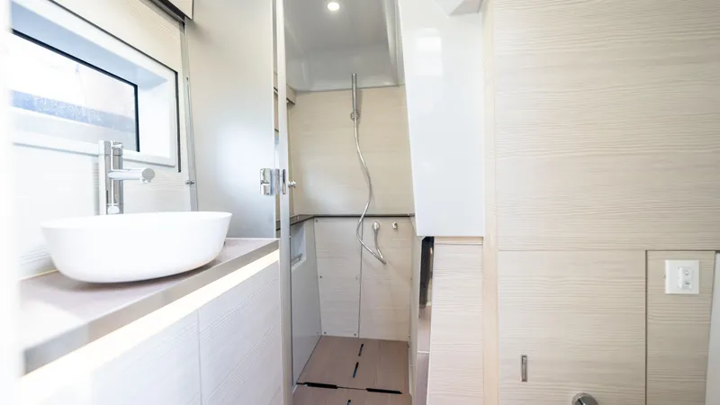 Slide: The Image of Modern bathroom interior on Catana YOT 41, 2025 model, featuring sleek design and fixtures. - 18