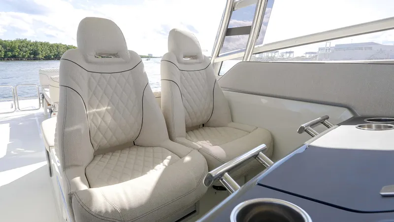 Slide: The Image of Luxurious seating on 2025 Catana YOT 41 boat, featuring quilted upholstery and modern design. - 21