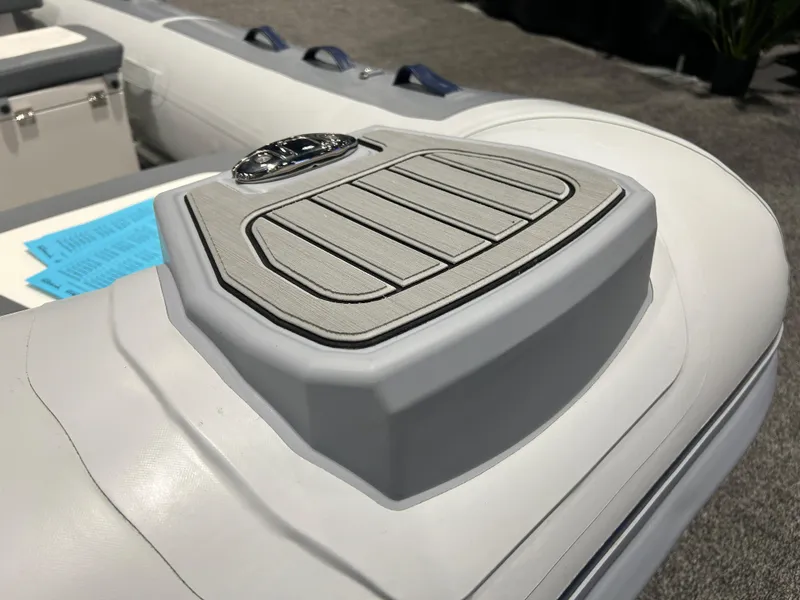 Slide: The Image of 2025 Highfield Classic 340 FCT boat detail, featuring a sleek control panel. - 3