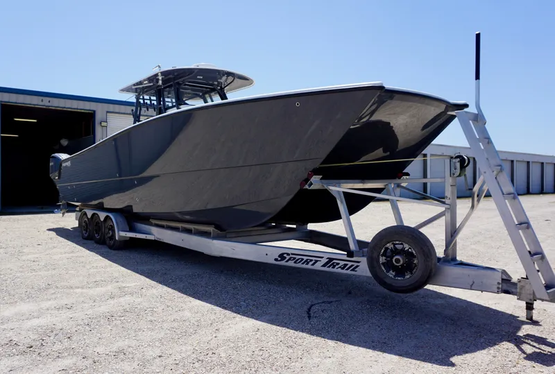 Slide: The Image of 2020 Freeman 37 VH boat on trailer outside storage facility. - 20