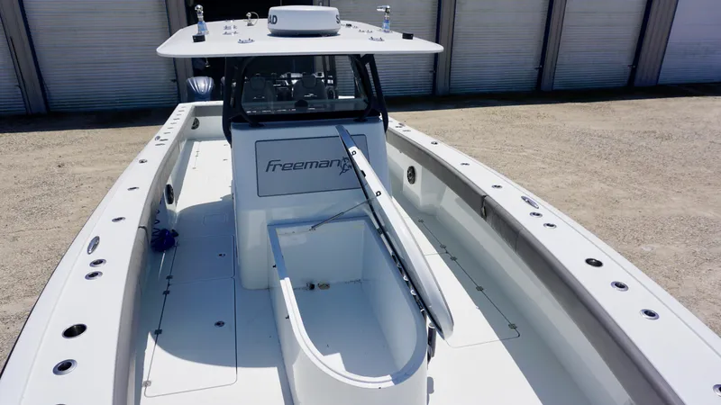 Slide: The Image of 2020 Freeman 37 VH boat with open deck and storage compartment. - 22