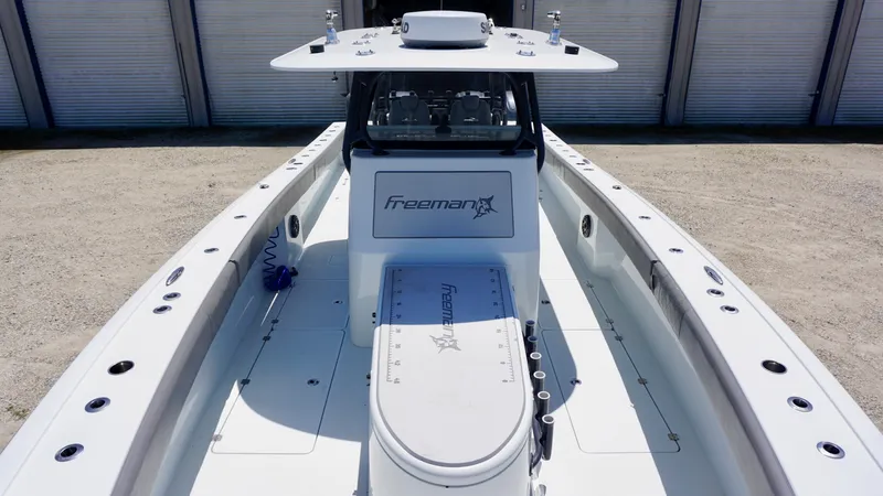 Slide: The Image of 2020 Freeman 37 VH boat, spacious deck, sleek design, ideal for fishing and leisure activities. - 23