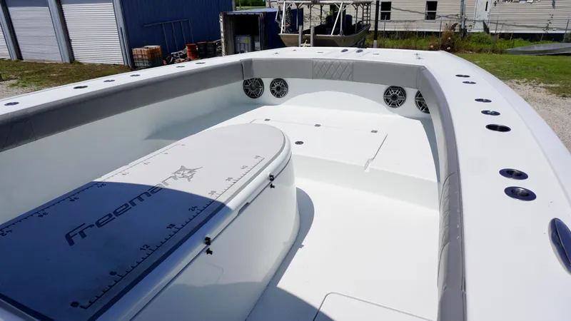Slide: The Image of 2020 Freeman 37 VH boat interior with spacious deck and seating. - 25