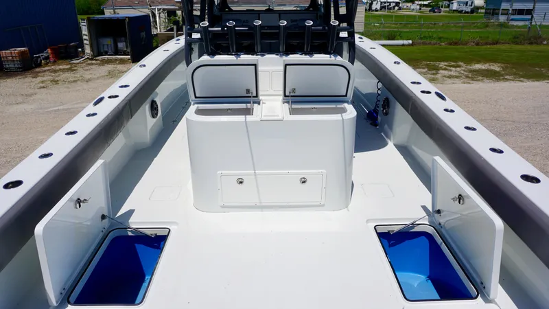 Slide: The Image of Freeman 37 VH 2020 boat deck with storage compartments and seating. - 29