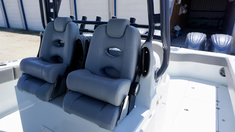 Slide: The Image of Two gray seats on a 2020 Freeman 37 VH boat deck. - 32