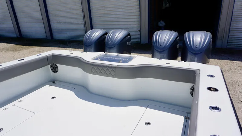 Slide: The Image of Freeman 37 VH 2020 boat deck with four outboard motors in storage area. - 35