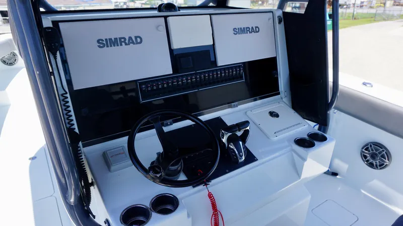 Slide: The Image of Control panel of a 2020 Freeman 37 VH boat with Simrad electronics. - 36