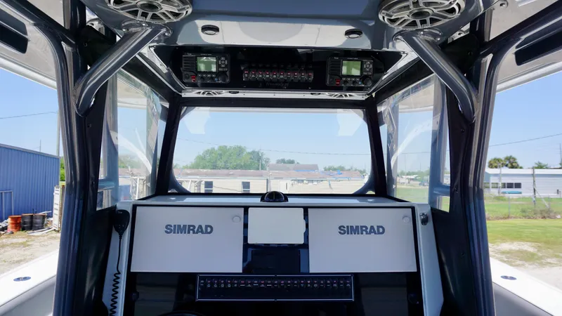 Slide: The Image of Interior view of a 2020 Freeman 37 VH boat with Simrad navigation equipment. - 37