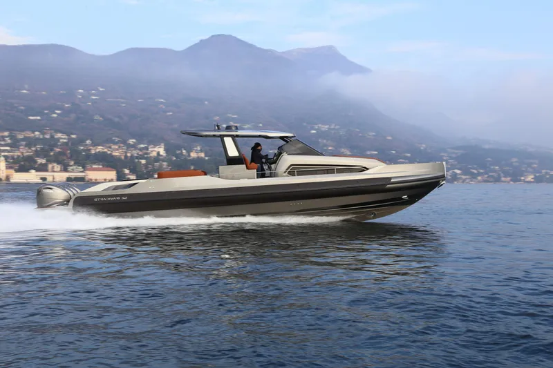 Slide: The Image of 2026 Capelli Stradivari 52 luxury boat cruising on a scenic lake. - 1