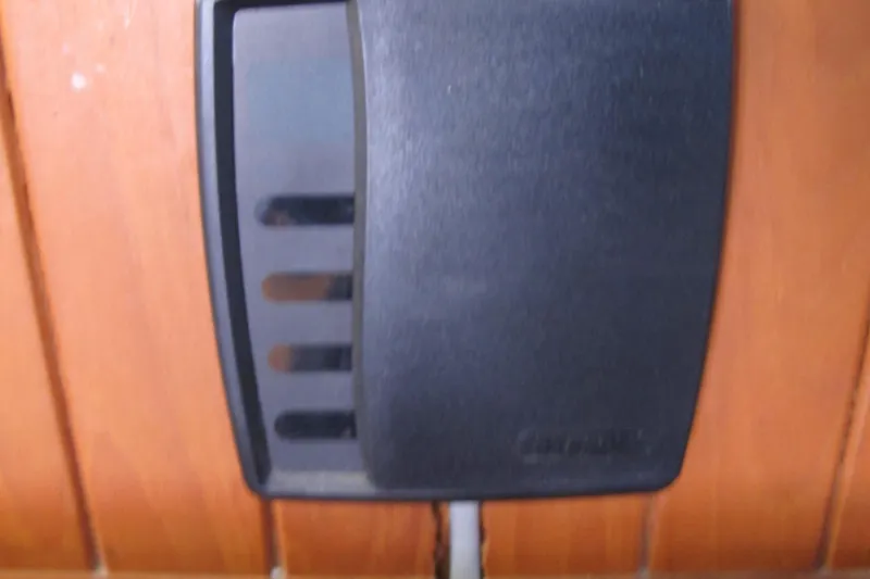 Slide: The Image of Black device on wooden surface, Monk 36 model, 1986. - 44