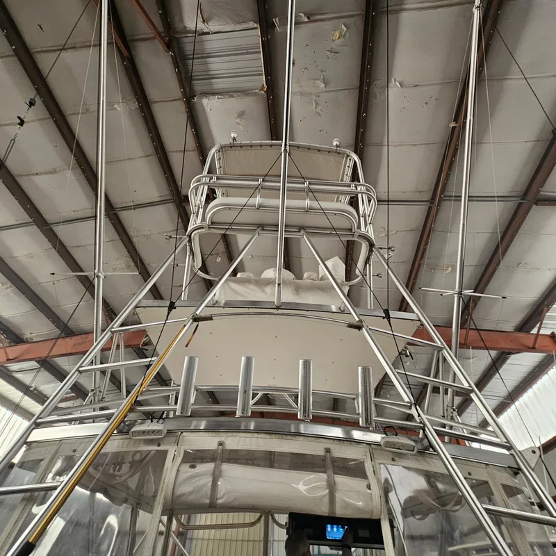 Slide: The Image of 1994 Blackfin 33 Combi boat tower in a storage facility. - 20