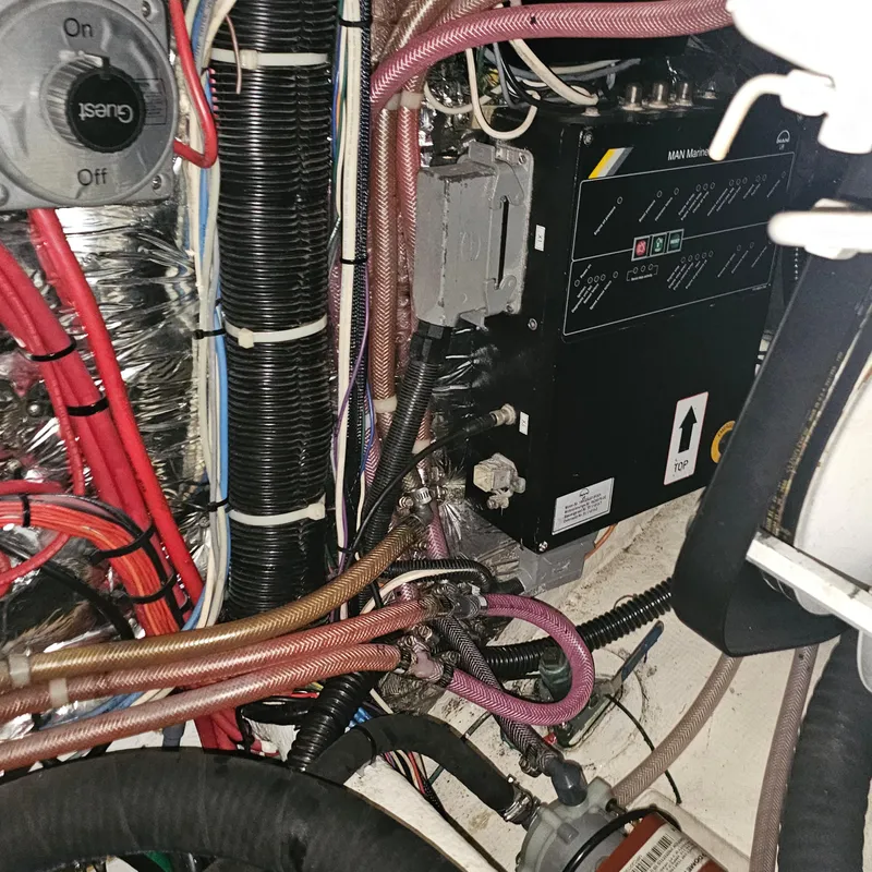 Slide: The Image of Electrical wiring and components inside a 1994 Blackfin 33 Combi boat. - 43