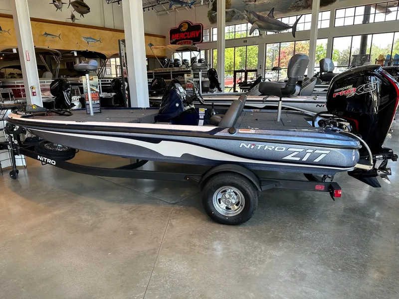 Slide: The Image of 2025 Nitro Z17 boat displayed in showroom with sleek design and powerful engine. - 1
