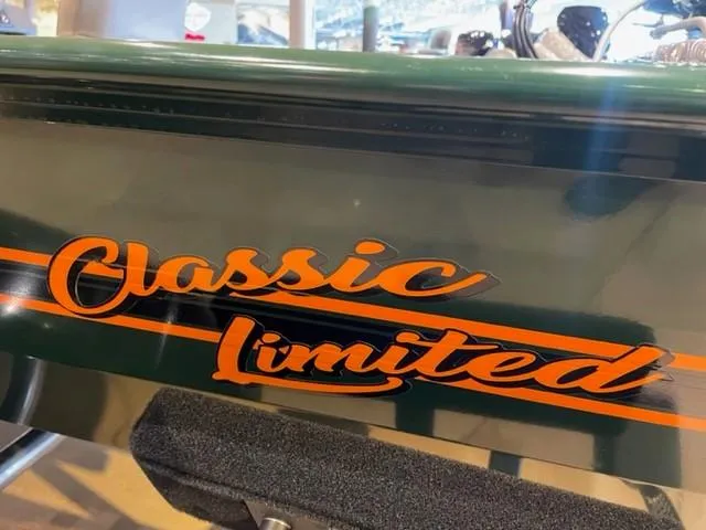 Slide: The Image of 2025 Tracker Bass Tracker Classic Limited logo on boat exterior. - 2
