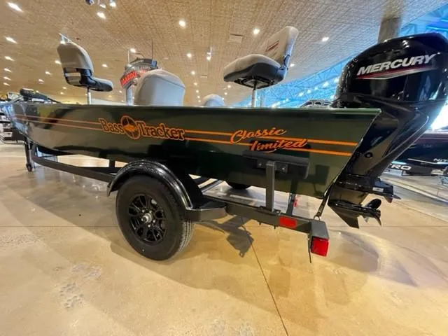 Slide: The Image of 2025 Tracker Bass Tracker Classic Limited boat with Mercury engine in showroom. - 43