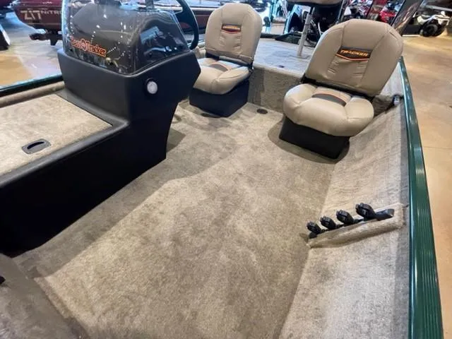 Slide: The Image of 2025 Tracker Bass Tracker Classic Limited boat interior with seating and control panel. - 49