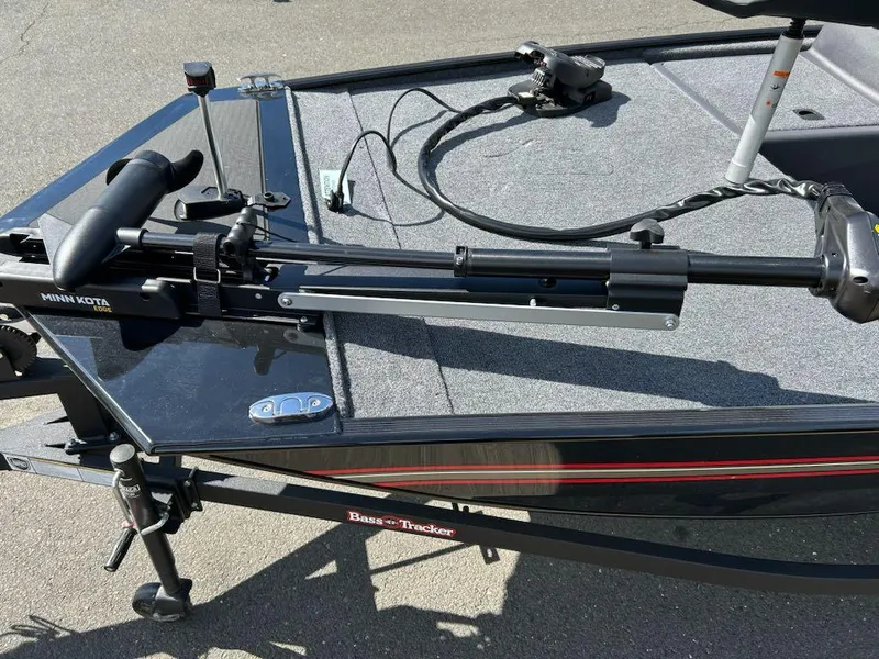 Slide: The Image of 2025 Tracker Bass Tracker Classic XL boat with Minn Kota trolling motor on deck. - 4