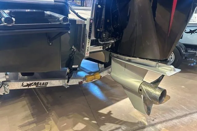 Slide: The Image of 2025 Mako 18 Pro Skiff Backwater Edition boat trailer and motor detail. - 11
