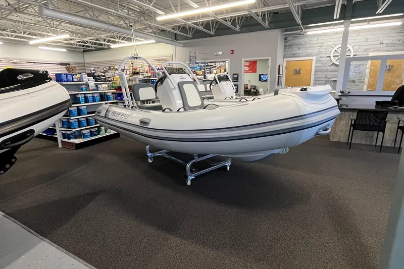 Slide: The Image of 2025 Highfield Classic 400 inflatable boat displayed in a showroom. - 4