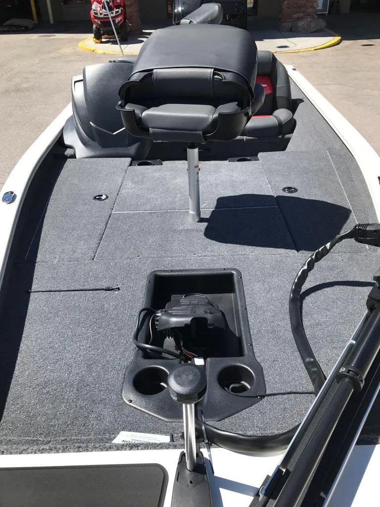 Slide: The Image of 2025 Tracker Pro Team 175 boat interior with seating and storage compartments. - 3