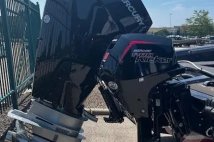 Slide: The Image of 2025 Nitro ZV21 Pro boat with Mercury Pro Kicker outboard motor. - 2