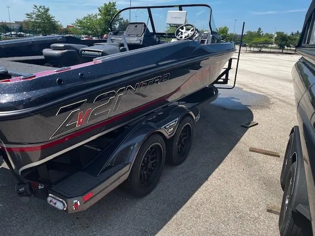 Slide: The Image of 2025 Nitro ZV21 Pro boat on trailer in parking lot. - 4