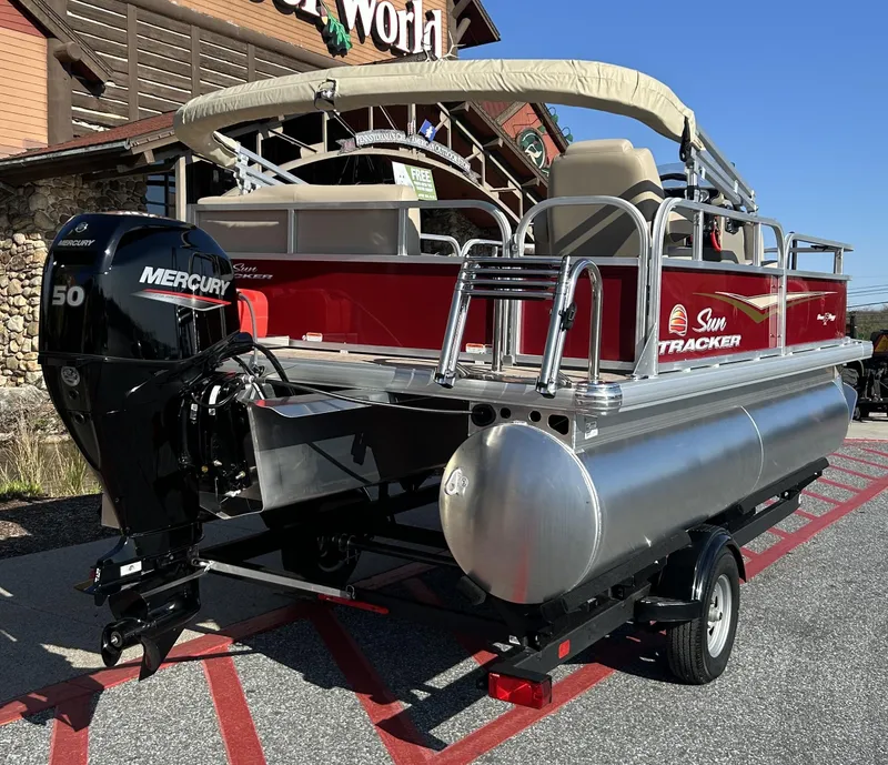 Slide: The Image of 2025 Sun Tracker Bass Buggy 16 XL Select pontoon boat with Mercury 50 engine. - 3