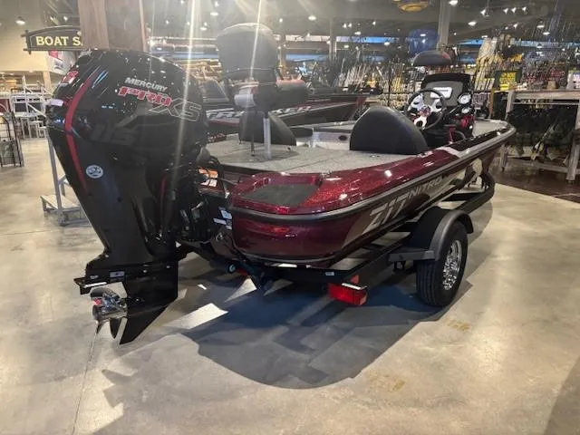 Slide: The Image of 2025 Nitro Z17 boat with Mercury Pro XS engine displayed in showroom. - 3