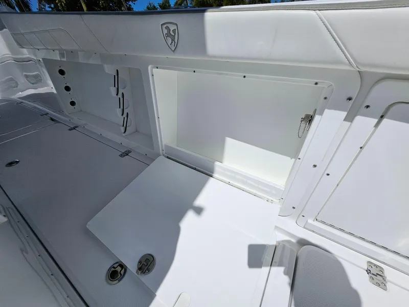 Slide: The Image of 2022 Century 2900 Center Console boat interior with storage compartments. - 22