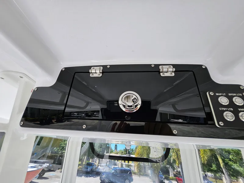 Slide: The Image of Century 2900 Center Console 2022 dashboard with control panel and storage compartment. - 24