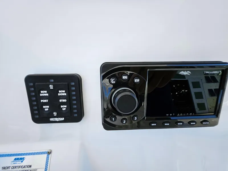 Slide: The Image of Control panel of a 2022 Century 2900 Center Console boat. - 26