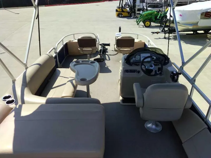 Slide: The Image of 2017 Sun Tracker Fishing Barge 22 XP3 interior with seating and steering console. - 7