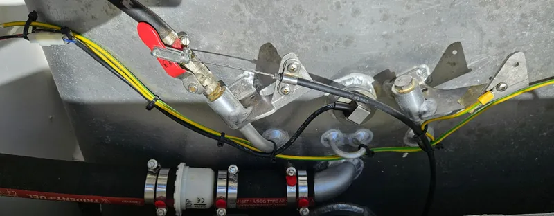 Slide: The Image of Engine compartment of 2019 Jeanneau Leader 7.5 CC with visible wiring and components. - 11