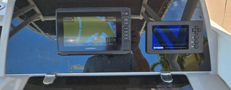 Slide: The Image of Dashboard of 2019 Jeanneau Leader 7.5 CC with Garmin and Yamaha displays. - 14