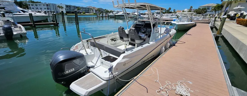 Slide: The Image of 2019 Jeanneau Leader 7.5 CC boat docked at marina with Yamaha engine. - 21